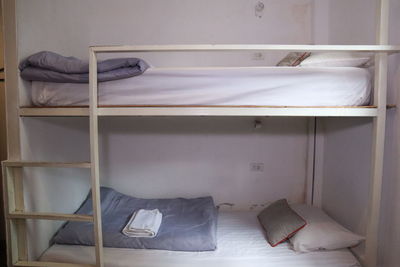 Empty bed in bedroom