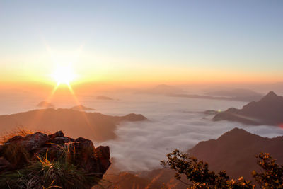 Scenic view of landscape against sky during sunset