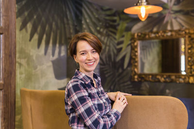 Portrait of smiling young woman