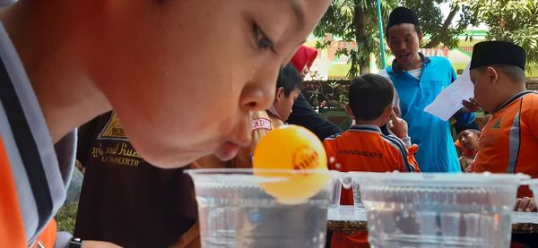 Group of people in drinking water