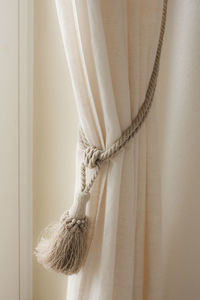 Curtain tied with rope at home