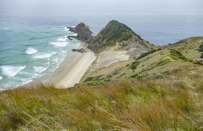 Coastal scenery with rock formation around cape reinga at the north island in new zealand