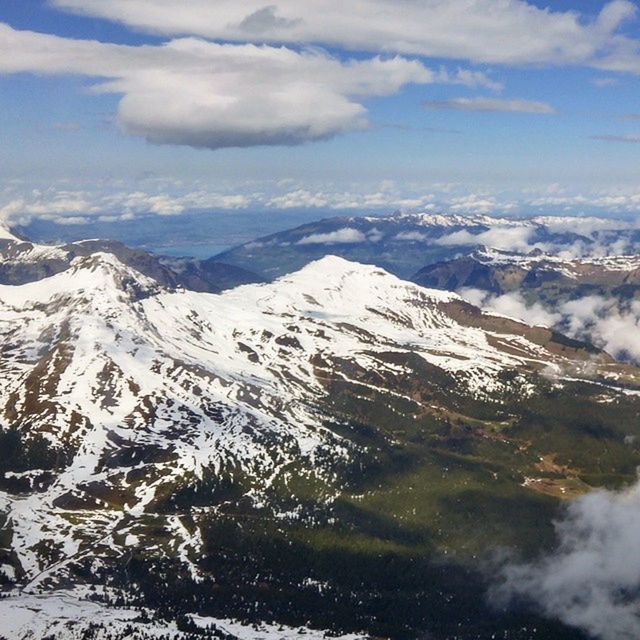 mountain, snow, winter, scenics, mountain range, cold temperature, tranquil scene, beauty in nature, tranquility, sky, snowcapped mountain, landscape, nature, weather, cloud - sky, season, idyllic, non-urban scene, majestic, covering