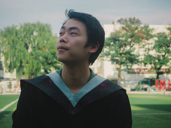 Portrait of young man looking away