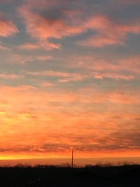 Scenic view of dramatic sky during sunset