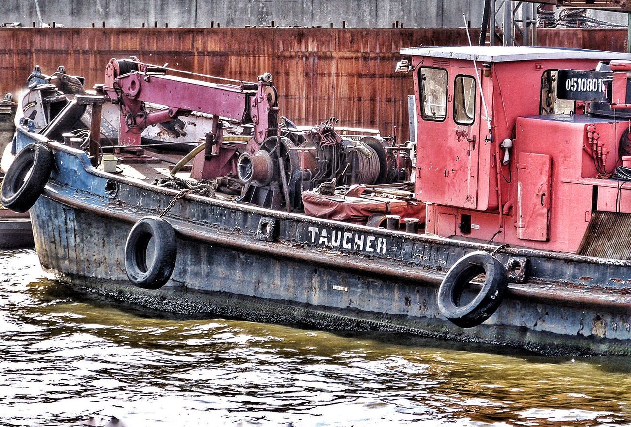 OLD MOTORCYCLE IN WATER