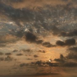 Low angle view of clouds in sky during sunset