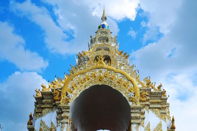 Low angle view of traditional building against sky blue sky