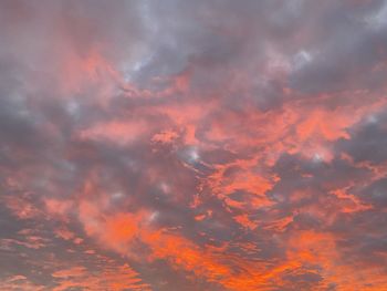 Low angle view of dramatic sky during sunset