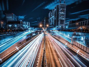 Light trails on city street at night