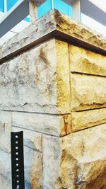 Low angle view of brick wall