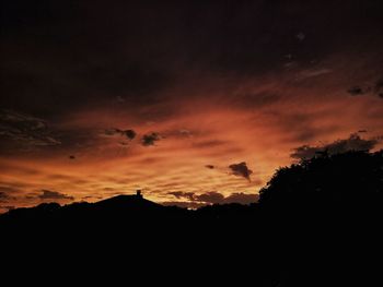 Scenic view of dramatic sky during sunset