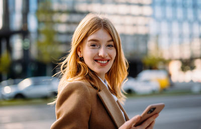 Young woman using mobile phone