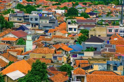 High angle view of houses in city