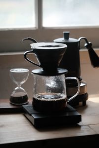 Close-up of coffee cup on table at home