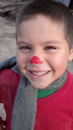 Close-up portrait of smiling boy