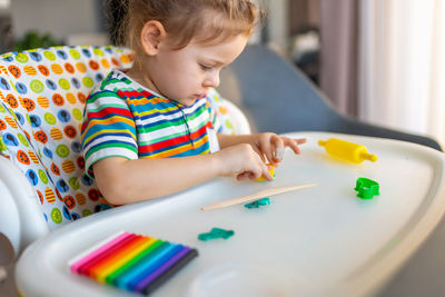 Close-up of boy painting