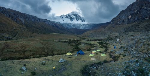 Scenic view of mountains against sky during winter