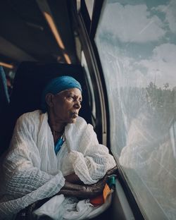 Man sitting in train
