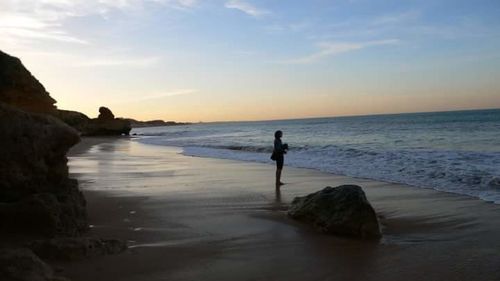 Scenic view of sea at sunset