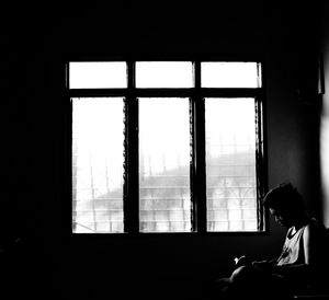 Reflection of trees on glass window