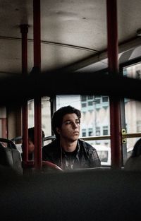 Thoughtful man traveling in bus
