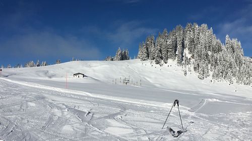 Scenic view of snow covered mountain against sky