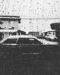 Rain drops on water