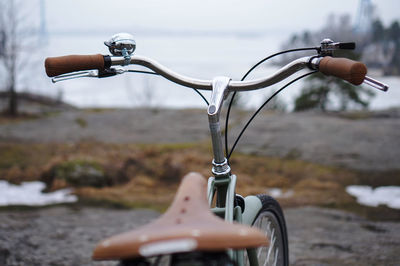 Close-up of bicycle on street