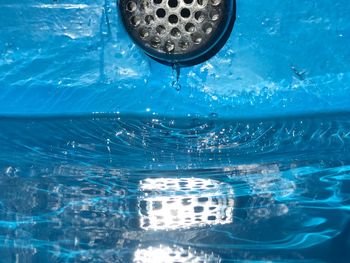 Close-up of water drops on swimming pool