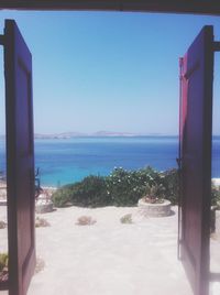 View of sea against blue sky