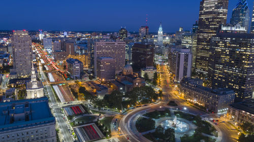 High angle view of illuminated buildings in city at night