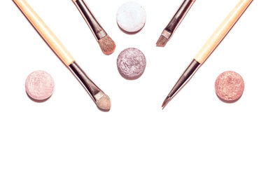 High angle view of eggs against white background