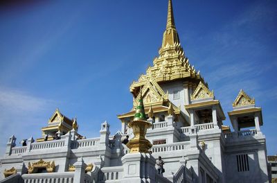 Low angle view of statue of building against sky