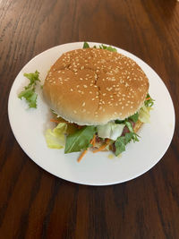 High angle view of burger in plate on table