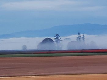 Scenic view of land against sky