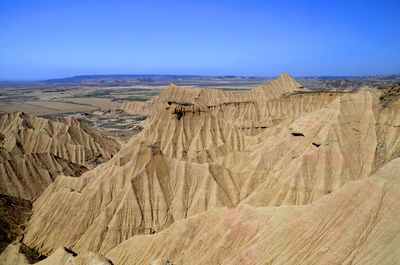 Scenic view of desert against sky