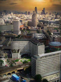 High angle view of buildings in city against sky