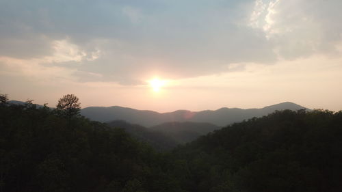 Scenic view of mountains against sky during sunset