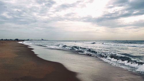 Scenic view of beach against sky