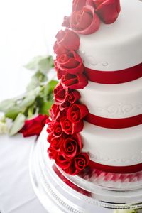 Wedding cake with red roses