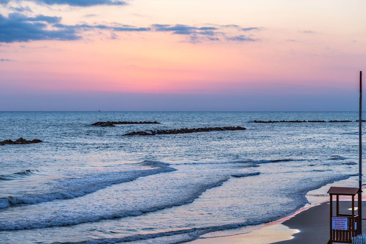 SCENIC VIEW OF SEA DURING SUNSET