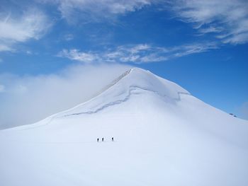 Scenic view of mountain peak against sky