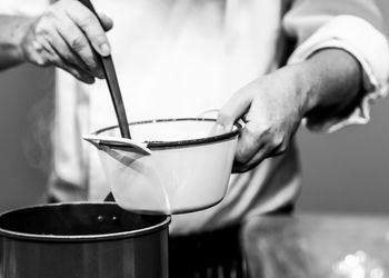 Close-up of person preparing food