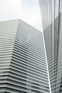 Low angle view of modern buildings against sky