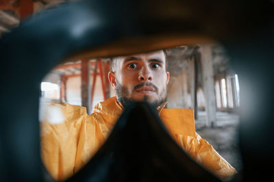Cropped image of woman in mirror
