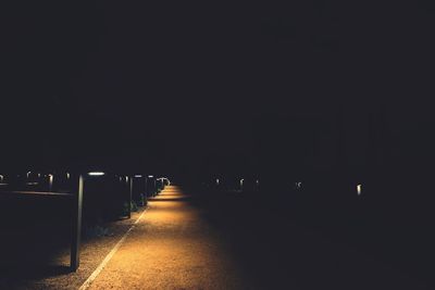 Illuminated footpath at night