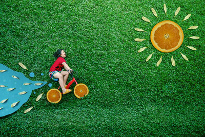 High angle view of boy playing on field