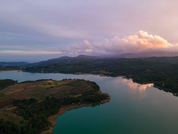 Scenic view of lake marathon against sky during sunset