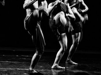 Low section of people dancing on stage